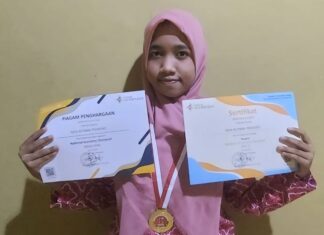 Reva Mutiara Raih Medali Emas di National Economy Olympiad 2022